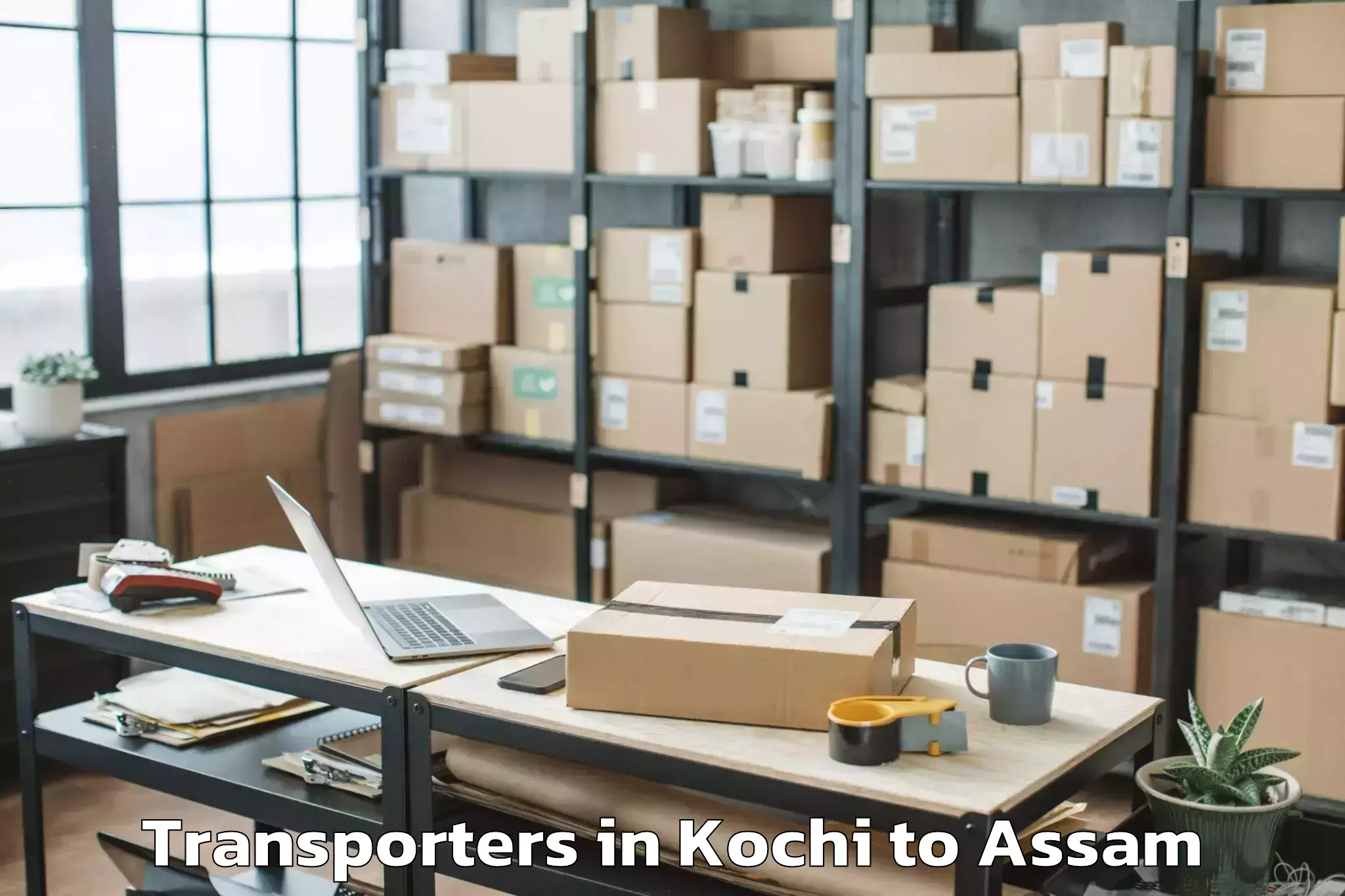 Top Kochi to Karipar Transporters Available